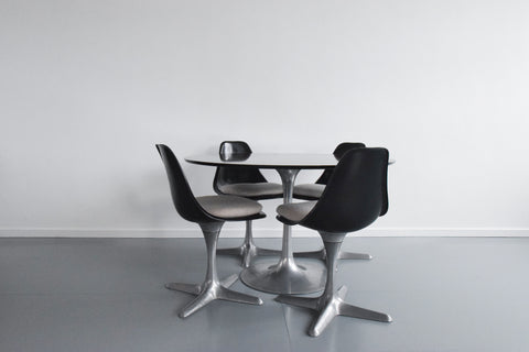 Vintage 1960s Rosewood Circular Tulip Dining Table and Four Black Chairs by Maurice Burke for Arkana