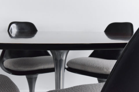 Vintage 1960s Rosewood Circular Tulip Dining Table and Four Black Chairs by Maurice Burke for Arkana