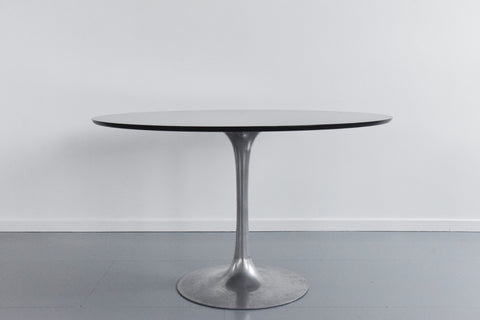 Vintage 1960s Rosewood Circular Tulip Dining Table and Four Black Chairs by Maurice Burke for Arkana