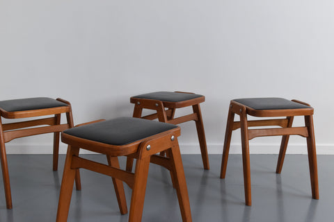 Vintage Set of Four 1960s Wooden Stackable Stools in Black Vinyl