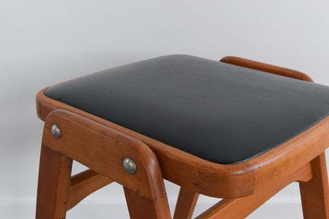Vintage Set of Four 1960s Wooden Stackable Stools in Black Vinyl