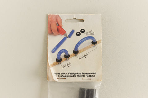 Vintage Packaged Pair of Black Plastic Flexi Handles
