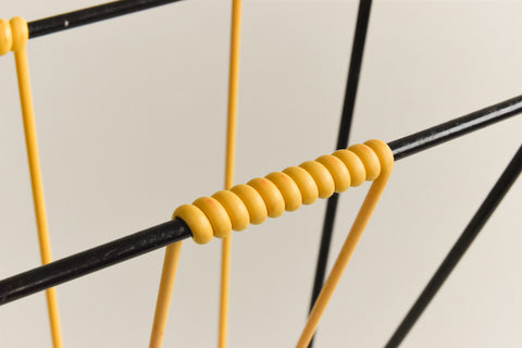 Vintage Black and Yellow Metal and Plastic Magazine Rack