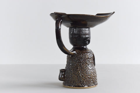 Whether for use as a fruit bowl, candle holder, or a handy catch all this striking piece is sure to look great in any home.