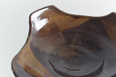 Whether for use as a fruit bowl, candle holder, or a handy catch all this striking piece is sure to look great in any home.